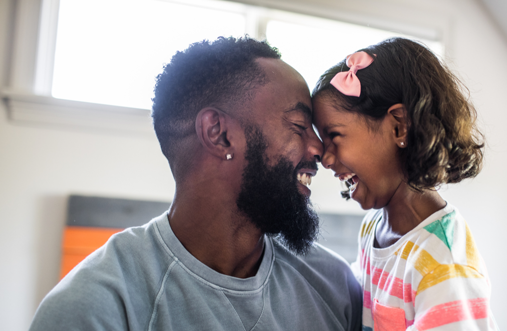 Father and daughter laughing