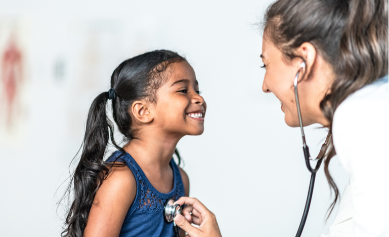 Young girl is examined by female doctor