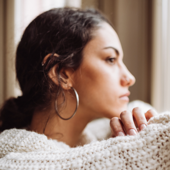 Woman in front of the window